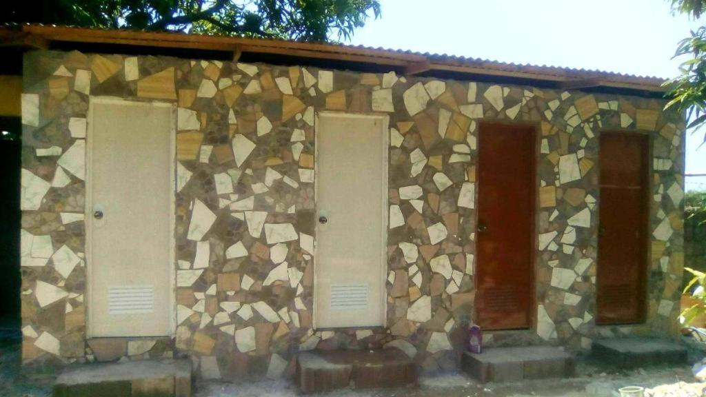 Traditional Filipino Transient House And Huts Near 100 Islands Wharf Alaminos Esterno foto